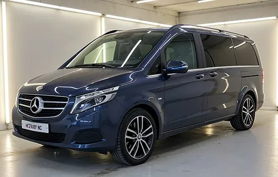 A blue Mercedes-Benz V-Class people mover